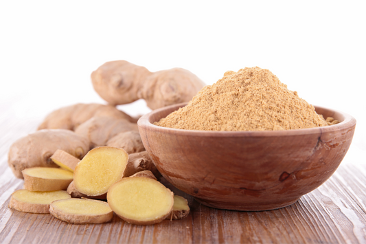 ginger root and ginger powder in a bowl